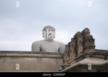 A gigiantic monolithic statue of Bahubali, also known as Gomateshwara, Vindhyagiri Hill, Shravanbelgola, Karnataka, India. Stock Photo