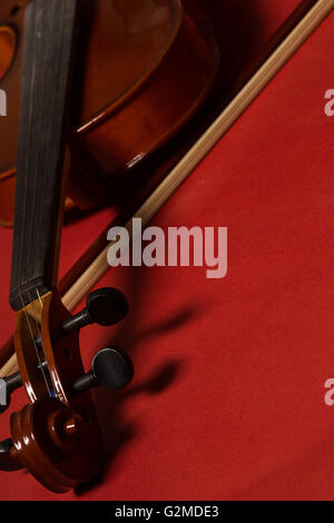 Old broken violin detailed shot Stock Photo