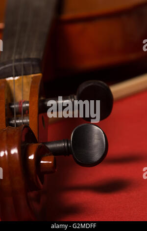 Old broken violin detailed shot Stock Photo