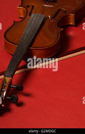 Old broken violin detailed shot Stock Photo