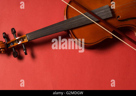 Old broken violin detailed shot Stock Photo