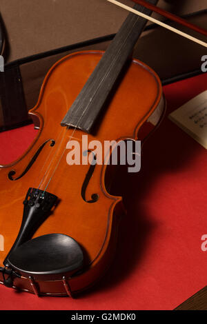 Old broken violin detailed shot Stock Photo