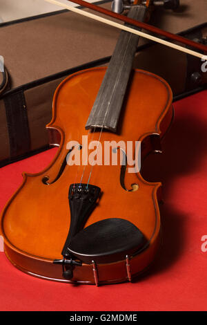 Old broken violin detailed shot Stock Photo