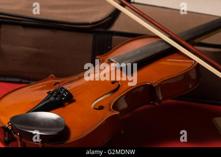 Old broken violin detailed shot Stock Photo