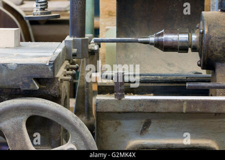 Detail of the hole cutter in the carpentry workshop Stock Photo