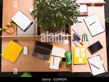 Business mess on working table in office Stock Photo