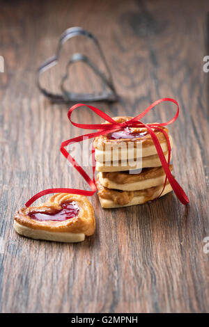 Jelly cookie on a rustic table with cookie cutter. Use it for a recipe. Stock Photo