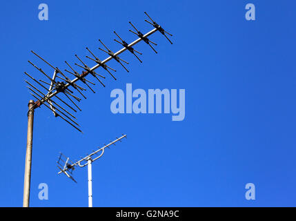 Television aerials against a  blue sky, Worcestershire, England, Europe Stock Photo