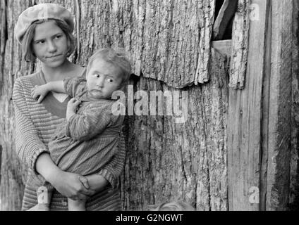 Two Children of Farmer Resettled on New Land, Virginia, USA, Arthur Rothstein for Farm Security Administration (FSA), October 1935 Stock Photo