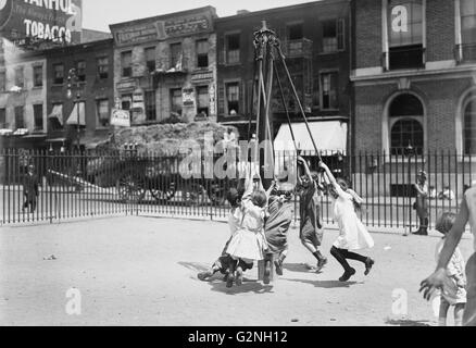Children in Playground,New York City,New York,USA,circa 1910 Stock Photo