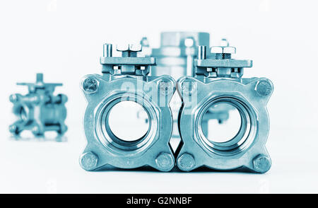 Group 3 valves, different sizes, ball valve with selective focus on thread fittings Stock Photo
