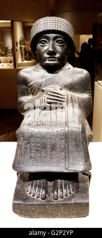 Statue of Gudea. Made from Diorite. Mesopotamian, from ancient Girsu. Circa 2150-2100 BC. Belongs to a series of diorite statue commissions by Gudea, who was governor of Lagash. Stock Photo