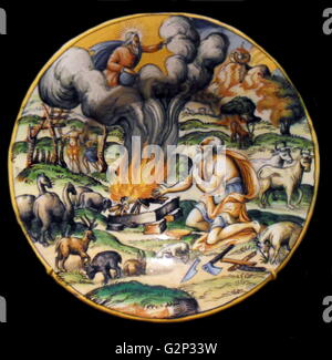 Decorative plate 'God Accepts Noah's Burnt Sacrifices'. Tin-enamelled earthenware, either maiolica or faience. From Lyon, mid-16th century. A scene from Genesis 8:20-22. Based on a woodcut by Bernard Salomon which was created for the vernacular Bibles published in Lyon in the 1550's. Stock Photo