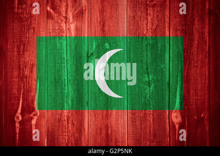 flag of Maldives or Maldivian banner on wooden background Stock Photo