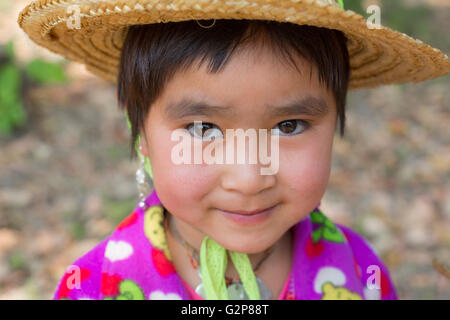Burmese child playing in fields. Village near Mandalay, Myanmar, Burma, South Asia, Asia Stock Photo
