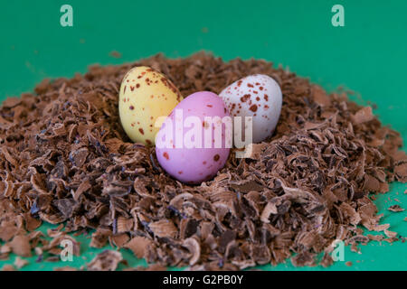 Chocolate eggs in nest Stock Photo