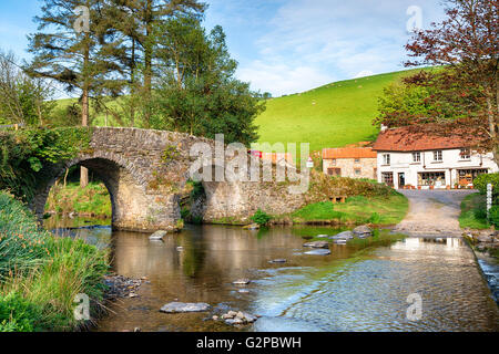 The bridge and ford at  Malmsmead in the Doone Valley directly on the border between Somerset and Devon and on Exmoor National P Stock Photo