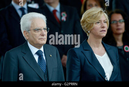 Rome, Italy. 02nd June, 2016. Sergio Mattarella (L) and the Minister of Defense Roberta Pinotti (R) during the 70th anniversary of Italian Republic. Italy celebrated the 70th anniversary of the Italian Republic. Before the President of the Republic and the highest authorities of the Italian State, the traditional military parade was held the national armed forces in the historic center of Rome. Thousands of this enthusiastic audience that accompanied the parade of the armed forces. In the picture, © Andrea Franceschini/Pacific Press/Alamy Live News Stock Photo