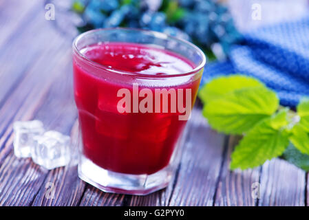 blueberry drink in glass and on a table Stock Photo