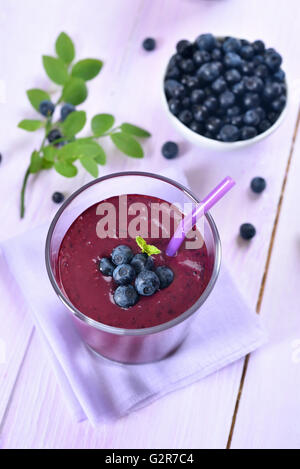 Blueberry juice, smoothie with fresh berries in glass Stock Photo