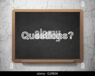 Learning concept: Questions? on chalkboard background Stock Photo