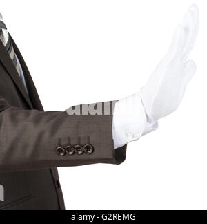 Mans hand in white glove showing stop gesture Stock Photo