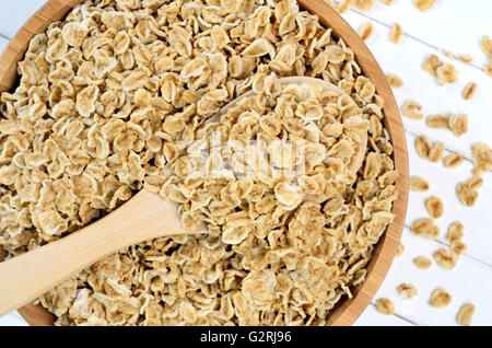 Heap of oats on bamboo bowl Stock Photo