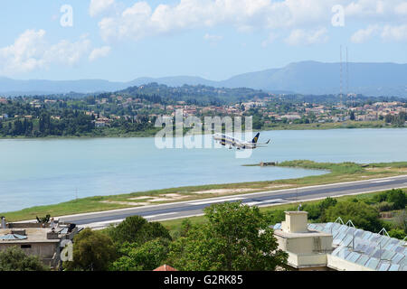 The aircraft of Ryanair Airlines taking off in Corfu International Airport Stock Photo