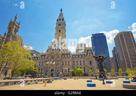 Philadelphia, USA - May 4, 2015: Square near Philadelphia City Hall with sculptures such as Government of the people sculpture. Stock Photo