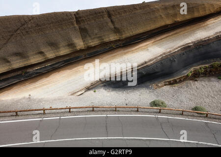 Mirador la Tarta (The Cake) in Teide National Park, shows road crossing layers of basalt and white pumis from different volcanic eruptions. Stock Photo