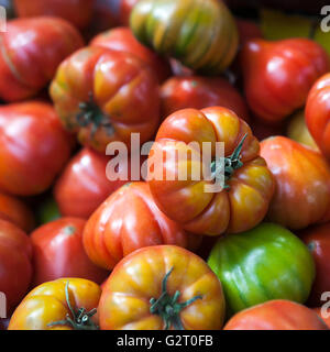 Ox-heart or Bull's Heart tomatoes at organic farmers market Stock Photo