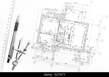Architectural background with technical drawings and tools. Blueprints series. Stock Photo