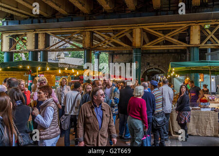 Crowds of people at Borough Market in Bermondsey, one of London's most popular food markets ,Southwark, London, UK Stock Photo