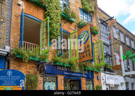 Neals's Yard in Seven Dials , a small alley in London's Covent Garden  named after the 17th century developer, Thomas Neale London, UK Stock Photo