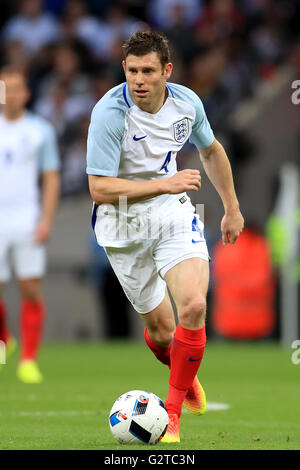 England's James Milner in action during the International Friendly at Wembley Stadium, London. Stock Photo