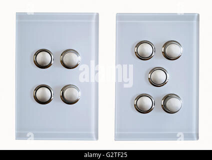 two modern light switches on a white background Stock Photo