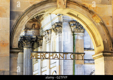 Archway with a sign indicating the entrance to Merchant City district of Glasgow city, Scotland, UK