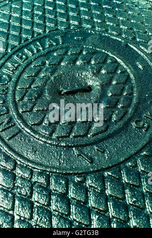 Iron sewer cover as background Stock Photo