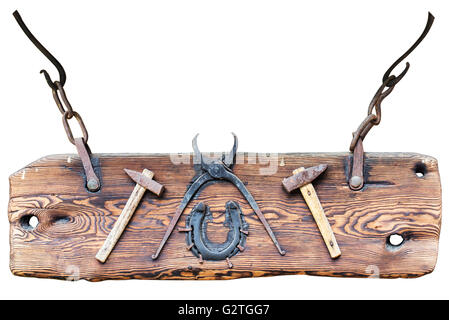 Wooden signboard with blacksmith tools isolated on white background Stock Photo