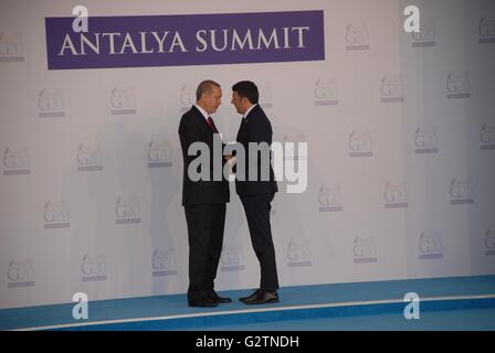 Italian Prime Minister Matteo Renzi (R) is greeted by Turkish President Recep Tayyip Erdogan, during the G20 Turkey Summit. Stock Photo
