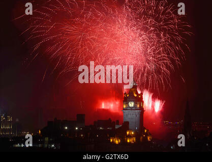 Scotland, Edinburgh, Fireworks for the closing of the Festival & Military Tattoo, view from Calton Hill across to the Castle with the clocktower & Balmoral Hotel. Stock Photo
