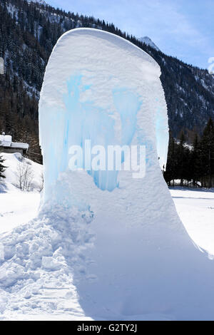 Iced up fountain in the ski resort of Courmayeur, Italy Stock Photo