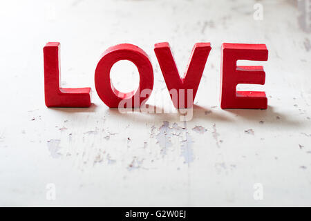 Letters love on wooden background Stock Photo
