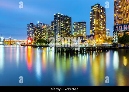 Long Island City skyline at dusk. LIC is the westernmost residential and commercial neighborhood of the NYC borough of Queens Stock Photo