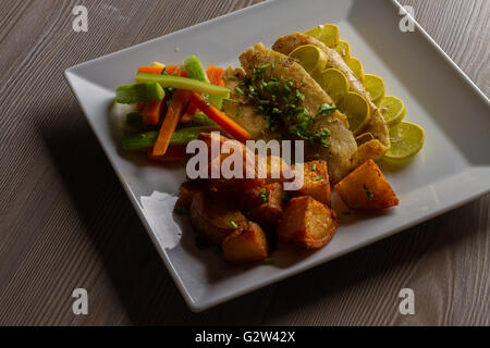 Fish with Potato cubes Stock Photo