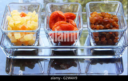 bright dried fruits in a transparent container Stock Photo