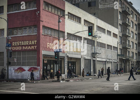 Los Angeles, California, USA. 4th Mar, 2016. A restaurant and food mart at 6th and San Julian Street provides a congregation point, whether open or closed. The Midnight Mission is across the street at 6th and San Pedro. © Fred Hoerr/ZUMA Wire/Alamy Live News Stock Photo