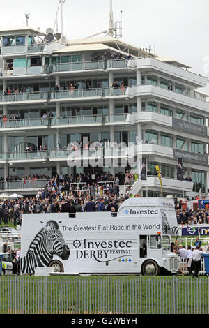 Epsom Downs, Surrey, England, UK. 3rd June 2016. Ladies Day at Epsom Downs race course. The traditional open top buses in front of the grandstand where race goers come to see the greatest flat racing in the world. Credit:  Julia Gavin UK/Alamy Live News Stock Photo
