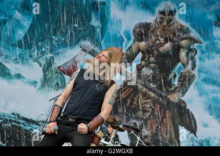 Nuremberg, Germany. 04th June, 2016. Johan Hegg, singer of Swedish death metal band Amon Amarth, performs at the Rock im Park music festival in Nuremberg, Germany, 04 June 2016. More than 80 bands are set to perform at the festival until 05 June. Photo: DANIEL KARMANN/dpa/Alamy Live News Stock Photo