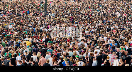 Nuremberg, Germany. 04th June, 2016. Visitors at the Rock im Park music festival on the Zeppelinfeld field of the former Nazi party rally grounds, in Nuremberg, Germany, 04 June 2016. More than 80 bands are set to perform at the festival until 05 June. Photo: DANIEL KARMANN/dpa/Alamy Live News Stock Photo